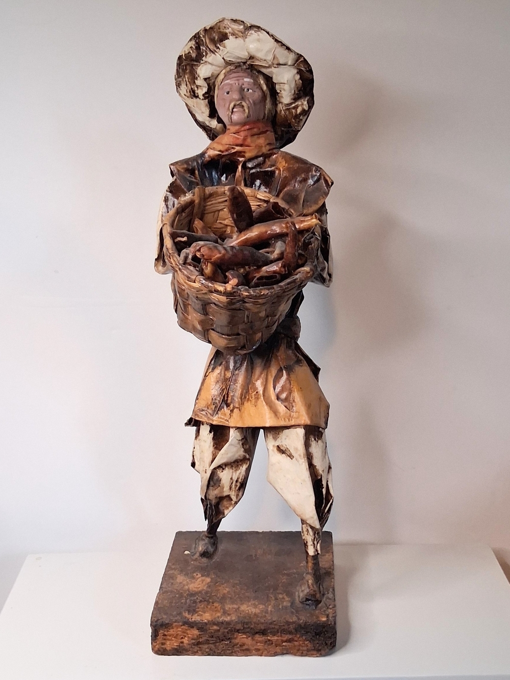 Handcrafted Paper Mache Rustic Fisherman Sculpture in Brown and Cream